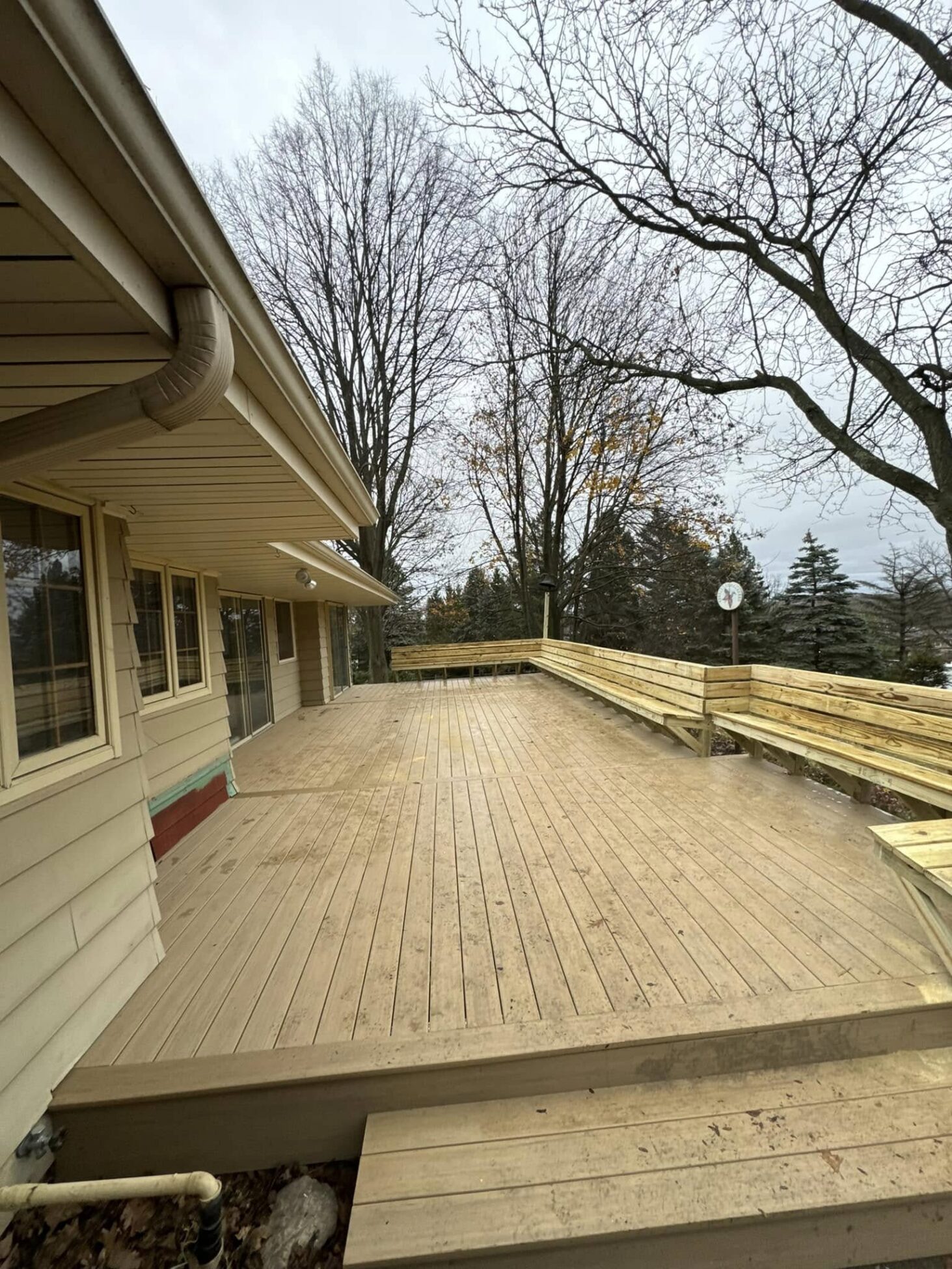 custom deck build with bench seating